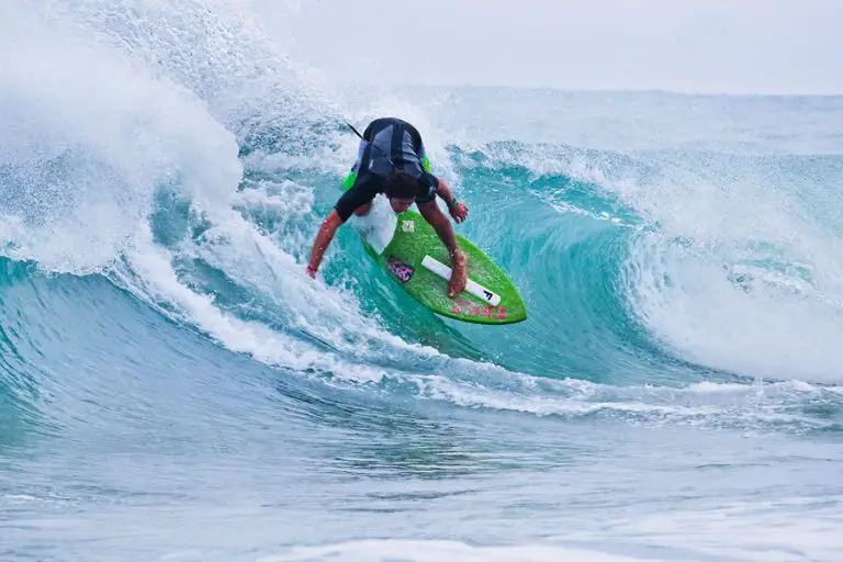 waxing a skimboard